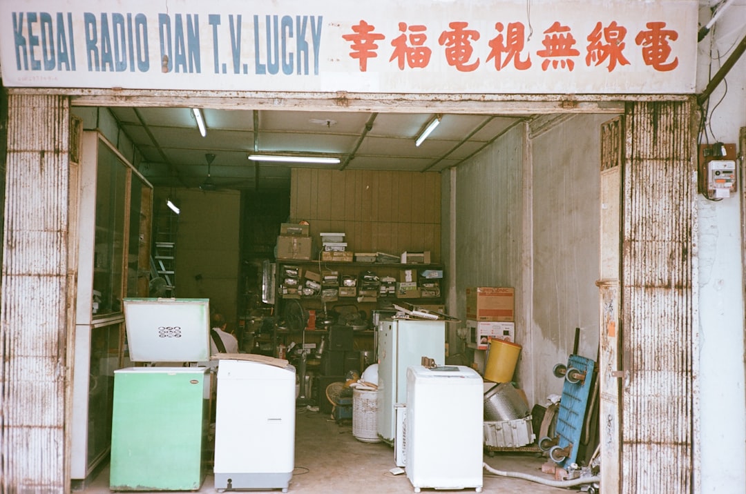 entrance-to-a-cluttered-electronics-repair-shop-voszgftxeue